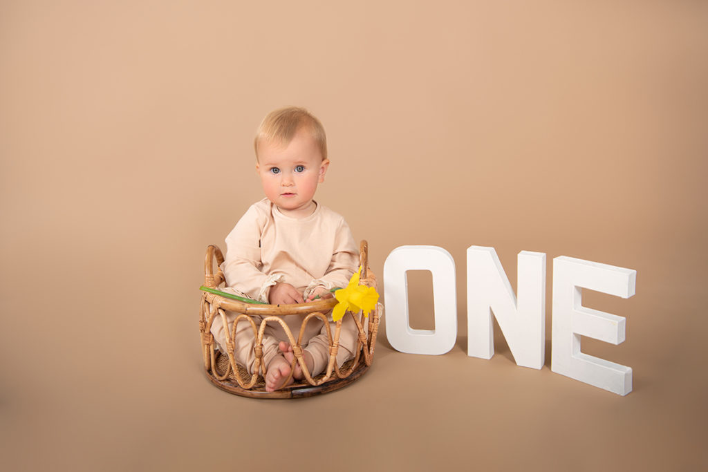 Baby photoshoot on solid color background